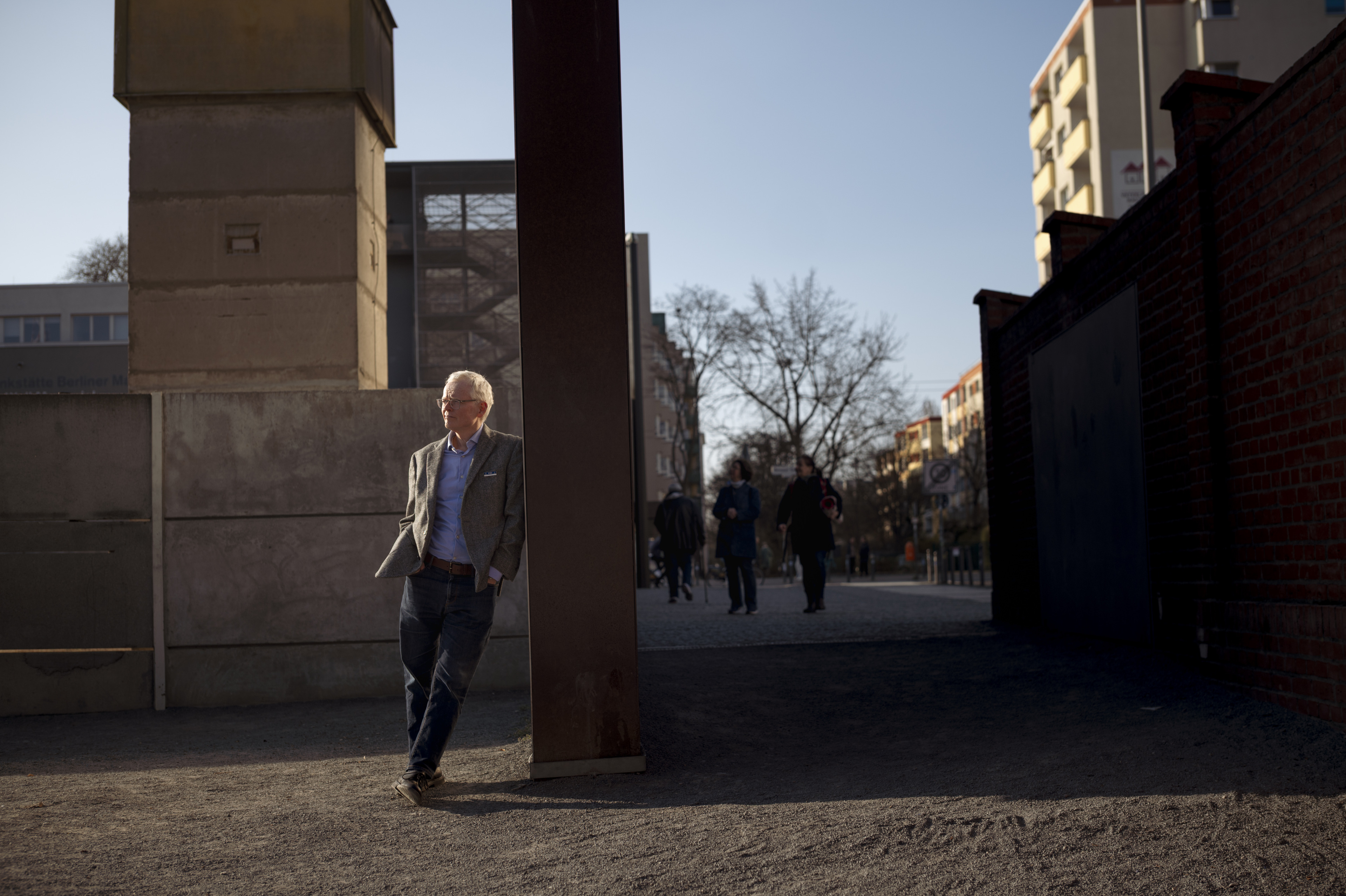 Ian Johnson leans against wall