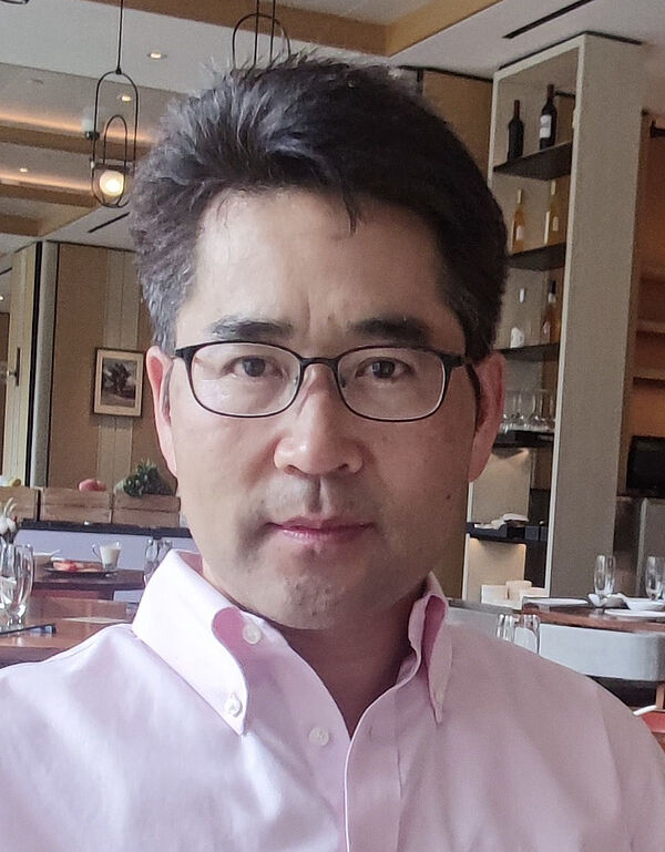 Porträt von Xi Chen