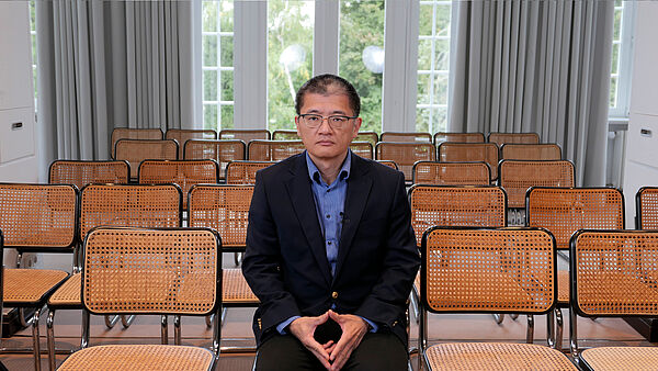 Portrait von Bin Xu